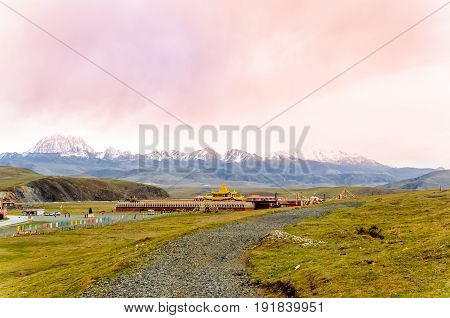 View on golden Muya Pagode by Tagong grassland in Sichuan