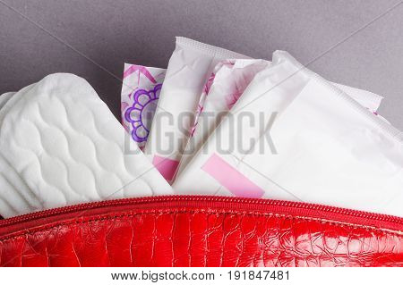Menstrual Tampons And Pads In Cosmetic Bag. Menstruation Time. Hygiene And Protection