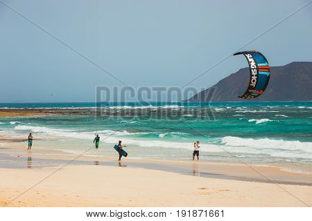 Corralejo, Fuerteventura, April 01, 2017: Unknown Kitesurfers On A Beach In Corralejo, Fuerteventura