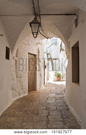 Characteristic alleyway of Cisternino. Puglia. Southern Italy.