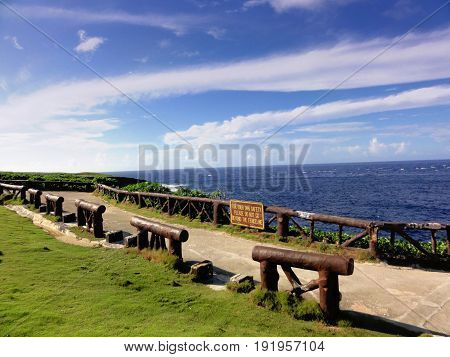 Banzai Cliff view, Saipan
View above the deep drop of Banzai Cliffs bordered by cement railings. Here thousands of  Japanese jumped to death during the World War 11.
