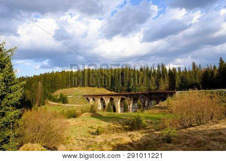 Mountain Landscape. With Old Viaduct Bridge In Vorohta, Ukraine. Carpathian Mountains.