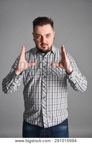 Young Bearded Man Bragging About Big Size Of Something
