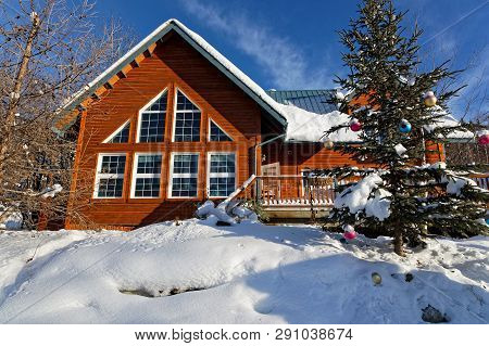 Dawson City, Yukon, Canada, March 10, 2019 : A Traditional House Of The City, Linked To The Klondike