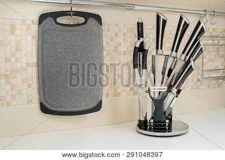 Set Of Six Kitchen Knives On A Modern Kitchen