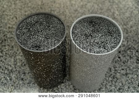 Two Stands For Knives On A Gray Background