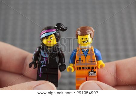 Tambov, Russian Federation - July 26, 2014 Lego Hard Hat Emmet And Wyldstyle Minifigure In Human Han