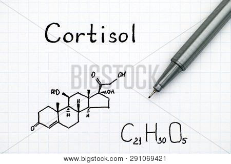 Chemical Formula Of Cortisol With Black Pen. Close-up.