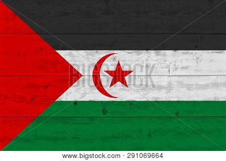 Sahrawi Arab Democratic Republic Flag Painted On Old Wood Plank. Patriotic Background. National Flag
