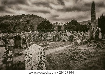 Old Ancient Celtic Cemetery, Tombstones And Monument On Mountain Background