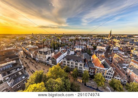 Aerial Skyline View Of Historic Groningen City Centre Under Setting Sun. The Netherlands
