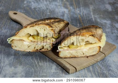 Ham And Cheese Sanwdich In A French Baguette, Made Of Paris Ham And Emmental With Some Sliced Pickle