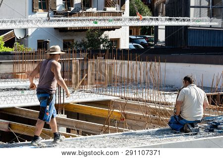 View Of The Construction Site In A Residential Area Where Builders Work.