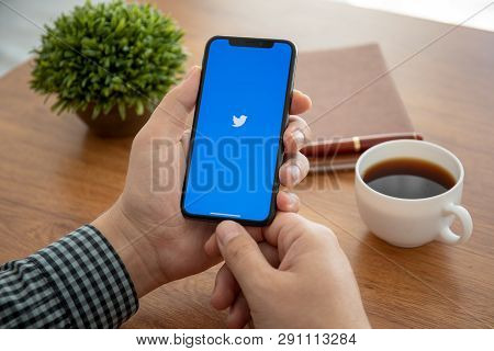 Alushta, Russia - October 8, 2018: Men Hand Holding Iphone X With Social Networking Service Twitter 