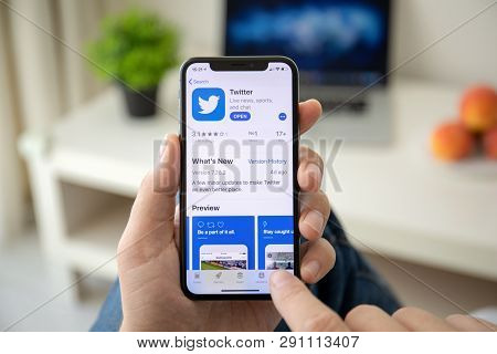 Alushta, Russia - July 29, 2018: Man Hand Holding Iphone X With Social Networking Service Twitter On