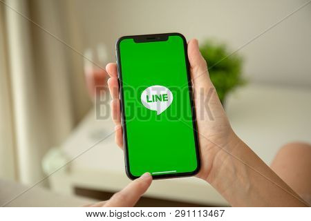 Alushta, Russia - July 29, 2018: Woman Hand Holding Iphone X With Social Networking Service Line On 