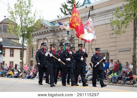 Stoughton, Wisconsin, Usa - May 20, 2018: Annual Norwegian Parade, Firefighters In Uniform, Carrying