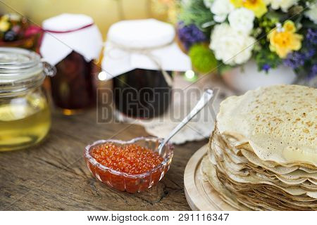 Traditional Russian Pancakes With Red Cavier And Honey