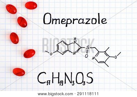 Chemical Formula Of Omeprazole With Red Pills. Close-up.