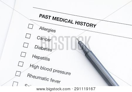 Past Medical History Questionary With Pen. Close-up.