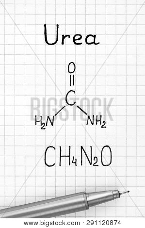 Chemical Formula Of Urea With Pen. Close-up.