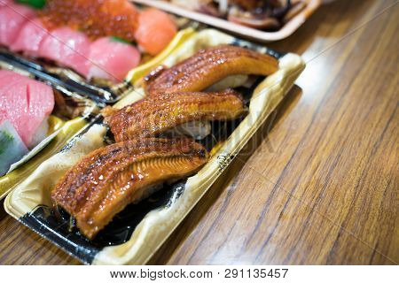 Eel Sushi, And Others Sushi; Salmon, Otoro, Shabby, Grilled Shrimp, Crab Are Arranged On The Table R
