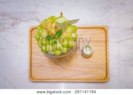 Green Melon Ball Shape Are Arranged On The Top Of Bingsu (korean Ice-cream Style) And Decorated With