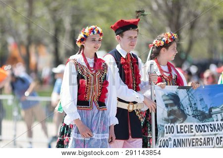 Chicago, Illinois, Usa - May 5, 2018: The Polish Constitution Day Parade, Men And Women Wearing Trad
