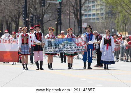 Chicago, Illinois, Usa - May 5, 2018: The Polish Constitution Day Parade, Men And Women Wearing Trad