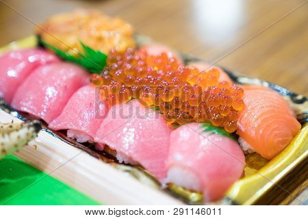 Sushi Salmon And Others Sushi Are Arranged In Foam Plant On The Table Ready To Eat At Kuromon Fish M
