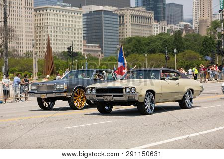 Chicago, Illinois, Usa - June 16, 2018: The Puerto Rican Day Parade, Cars Donk Modified Carrying Pue