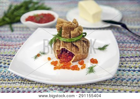 Traditional Russian Pancakes With Red Cavier And Honey