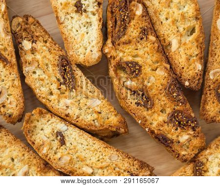 Classic Italian Biscotti Cookies On A Wooden Background. Baked Crispy Biscuits.