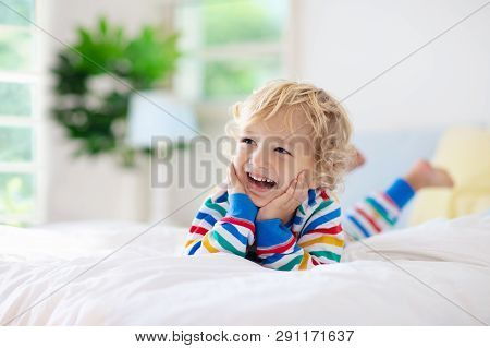 Kids Sail On Yacht In Sea. Child Sailing On Boat. Little Boy In Safe Life Jackets Travel On Ocean Sh