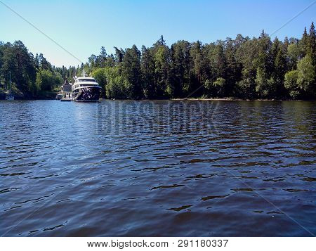 Mighty Trees Grow Along The Shores Of Valaam Island. The Wonderful Island Valaam Is Located On Lake 
