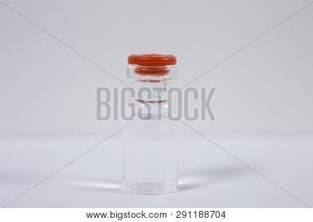 Group Of Vials With Medication On Blue Methacrylate Table. Horizontal Composition.