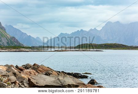 Lofoten Stony Fjord And Mountains Summer Cloudy Landscape, Norway.