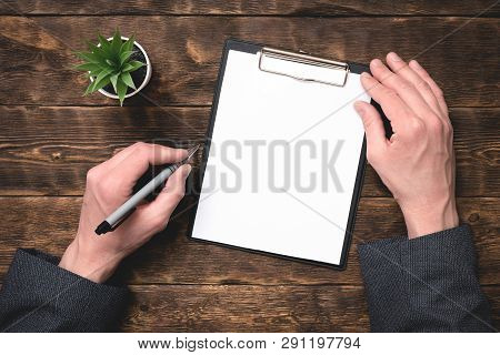 Signing Of Business Contract Or Agreement Mock Up. To Do List With Copy Space. Blank Paper Page In A