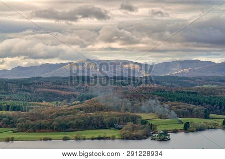 A Panoramic View Of The Windermere And The Coniston Fells In The English Lake District.