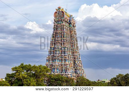 The North Gopuram Of The Meenakshi Temple In Madurai, India. A Gopuram Is A Monumental Gatehouse Tow