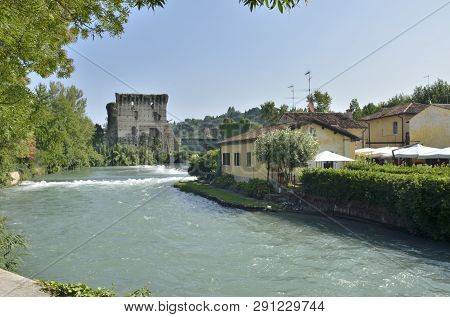 Old Fortress On River Mincio In Borguetto, A Ancient Village  In The Municipality Of Valeggio, In Th