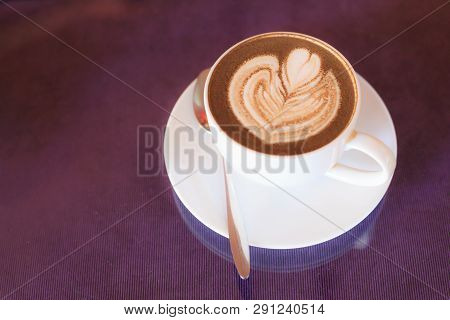 Hot Cappuccino Coffee Decorated With Blooming Flower Froth Art On Steamed Milk Foam In White Cup On 