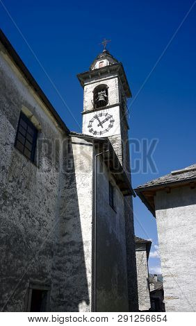 Tower Of The Churck Of Campo Rasa, Switzerland In Blue Sky