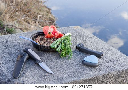 Still life of food and appliances. Front view.