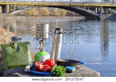 Picnic in nature. Picnic near the water. Cooking outside.