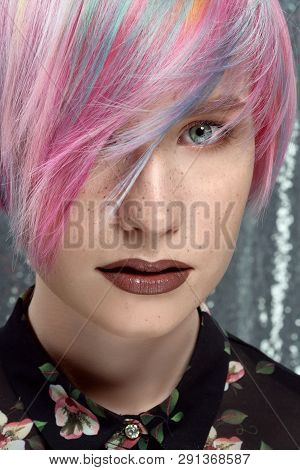 Young Beautiful Girl With Freckles. Colored Hair, Blue, Yellow, Red, Lilac And Pink. Pixie Bob Hairc