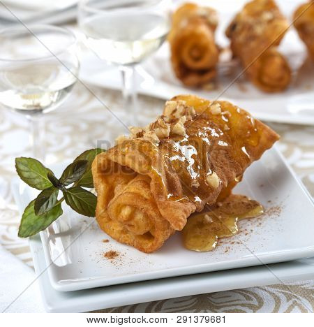 Greek Diples Are Thin Sheets Of Dough That Are Folded While Being Fried Into A Crispy Package That I
