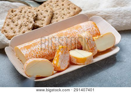 Fagotin Cheese With  Orange Coloured Rind Made From Cow Milk In Caves Of Maredsous Abbey, Belgium Cl