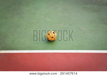 Sepak Takraw Ball Or Rattan Ball On Field Of Sepak Takraw Court With Line On Sport Outdoors