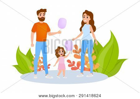 Happy Mother, Father And Smiling Child With Cotton Candy